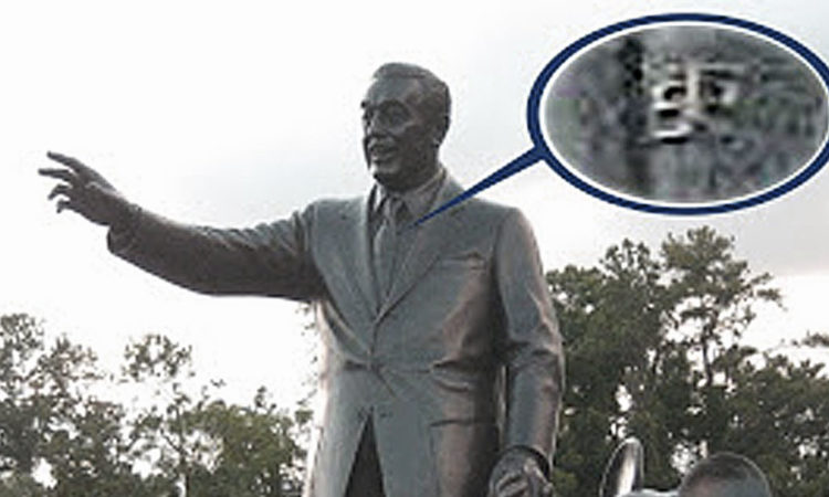 Walt Disney's tie pin in the Magic Kingdom Partners statue contains Smoke Tree Ranch logo