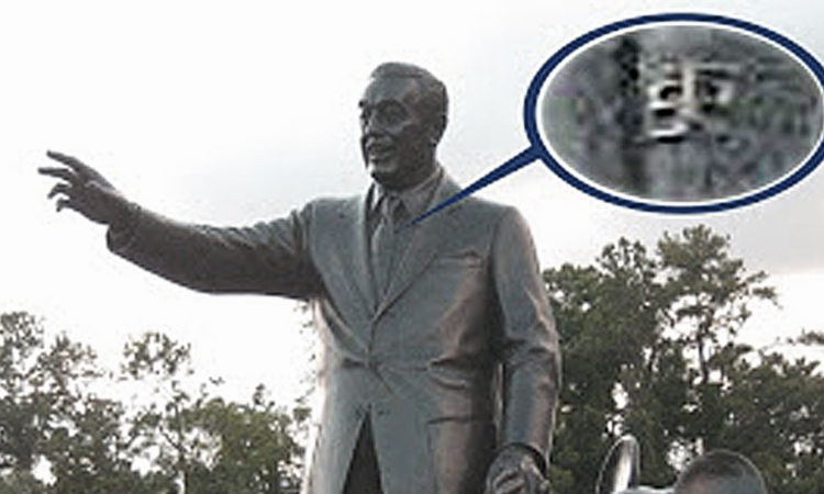 Walt Disney's tie pin in the Magic Kingdom Partners statue contains Smoke Tree Ranch logo