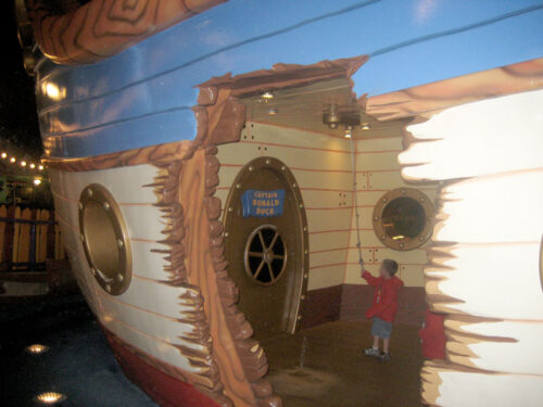 A hole ripped into the side of Donald's Boat by a shark in Mickey's Toontown Fair