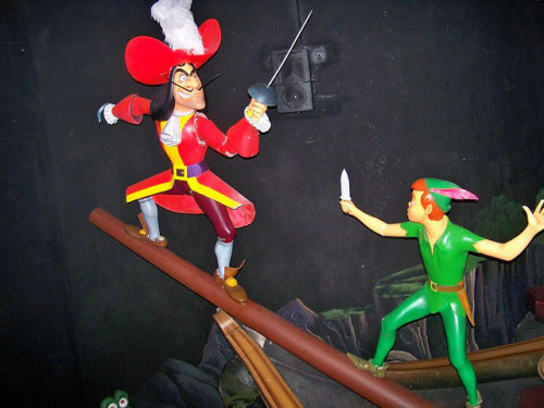 Disneyland's version of Peter Pan's Flight shows Captain Hook dueling with sword in left hand. Captain Hook's hook is on the right.