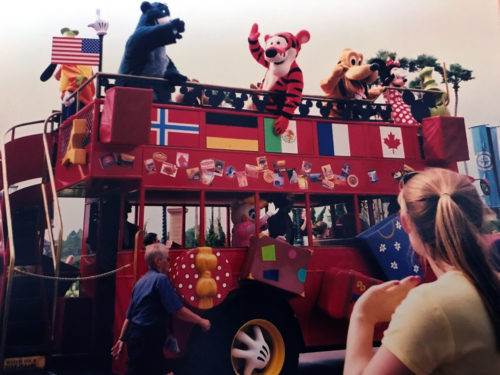 Characters on Holiday double-decker bus at Epcot World Showcase