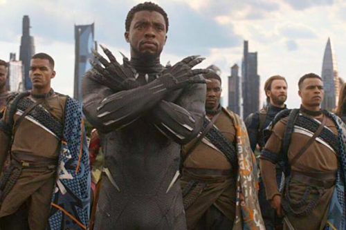 T'Challa as Black Panther shows the Wakanda salute