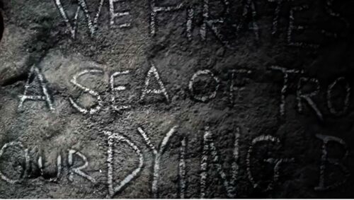 Riddle in Dead Man's Grotto on Pirate's Lair on Tom Sawyer Island: "We pirates face a sea of troubles, our dying breaths are only..."