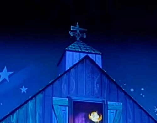 The Mary Poppins weathervane from the Great Movie Ride is on top of a barn in Mickey & Minnie's Runaway Railway