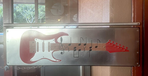 Rock 'n' Roller Coaster Starring Aerosmith Guitar Door handle with musical notation
