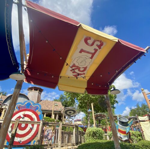 A shade structure that says "Storm" in the Barnstormer starring the Great Goofini